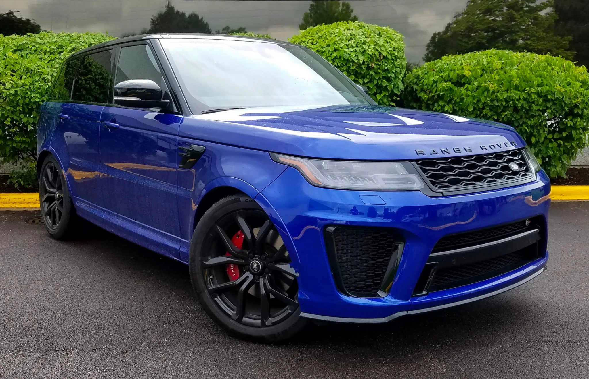 Estoril Blue Range Rover Sport SVR, front three-quarter view
